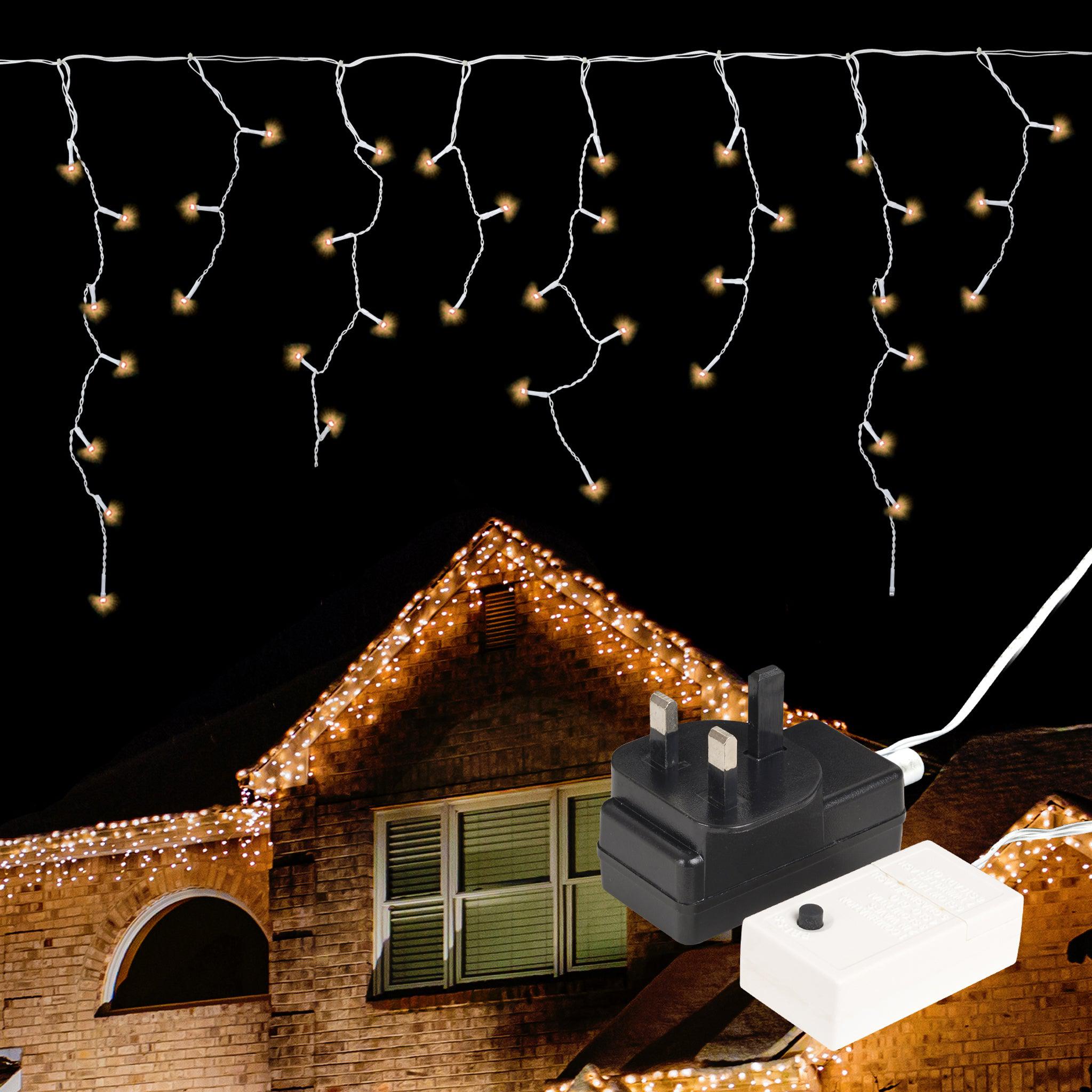 LED Indoor & Outdoor Snowing Icicle Chaser Lights with White Cable (960 Lights) - Warm White Lights Lighting Bargainia