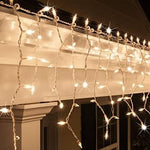 LED Indoor & Outdoor Snowing Icicle Chaser Lights with White Cable (960 Lights) - Warm White Lights - Bargainia.com - 