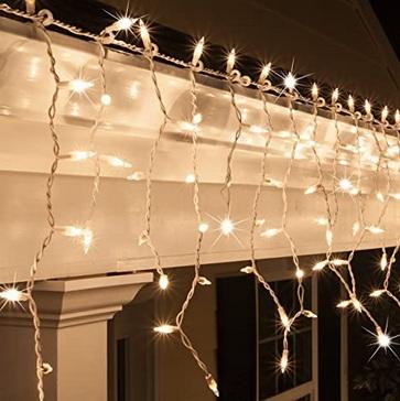 LED Indoor & Outdoor Snowing Icicle Chaser Lights with White Cable (960 Lights) - Warm White Lights Lighting Bargainia
