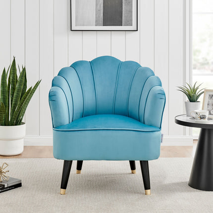 Blue velvet shell tub chair front on